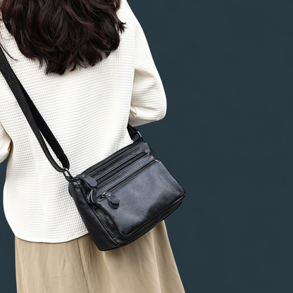 Geanta dama din piele naturala, Lucmark, design practic, compartimentare eficienta, curea reglabila, dimensiuni 24 x 10 x 18 cm, negru