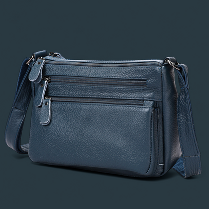 Geanta dama din piele naturala, Lucmark, design practic, compartimentare eficienta, curea reglabila, dimensiuni 24 x 10 x 18 cm, albastru