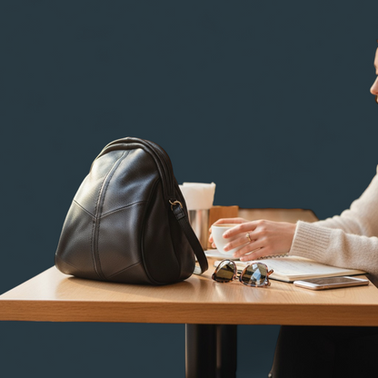 Geanta dama tip rucasc, Lucmark, piele naturala, design minimalist, compartimentare eficienta, dimensiuni 29,5 x 15 x 23,5 cm, negru