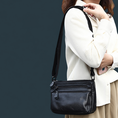 Geanta dama din piele naturala, Lucmark, design practic, compartimentare eficienta, curea reglabila, dimensiuni 24 x 10 x 18 cm, negru