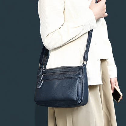 Geanta dama din piele naturala, Lucmark, design practic, compartimentare eficienta, curea reglabila, dimensiuni 24 x 10 x 18 cm, albastru