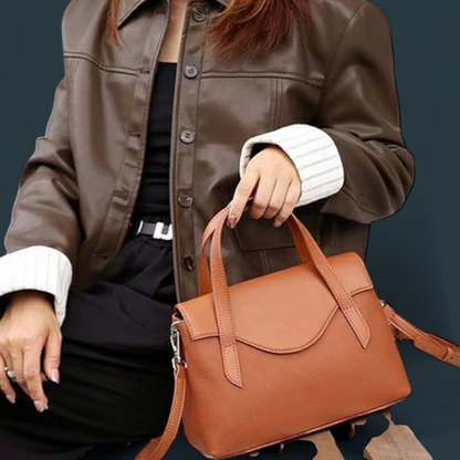 Geanta dama din piele naturala, Lucmark, compartimentare eficienta, design elegant, versatila, curele reglabile si detasabile, dimensiuni 25.5 x 11 x 17 cm, culoare – Maro