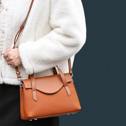 Geanta dama din piele naturala, Lucmark, compartimentare eficienta, design elegant, versatila, curele reglabile si detasabile, dimensiuni 25.5 x 11 x 17 cm, culoare – Maro